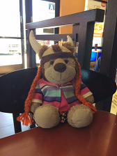 A stuffed lion on a table